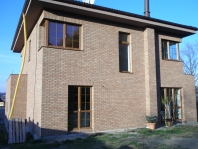 Obloženi fasády cihlovými pasky
